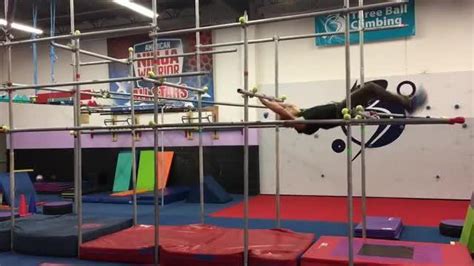 Guy Creatively Swings Across Gymnastics Bars Jukin Licensing