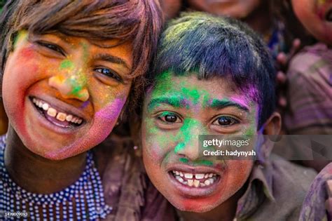 Colors Of India Indian Children Playing Colorful Powders During Holi