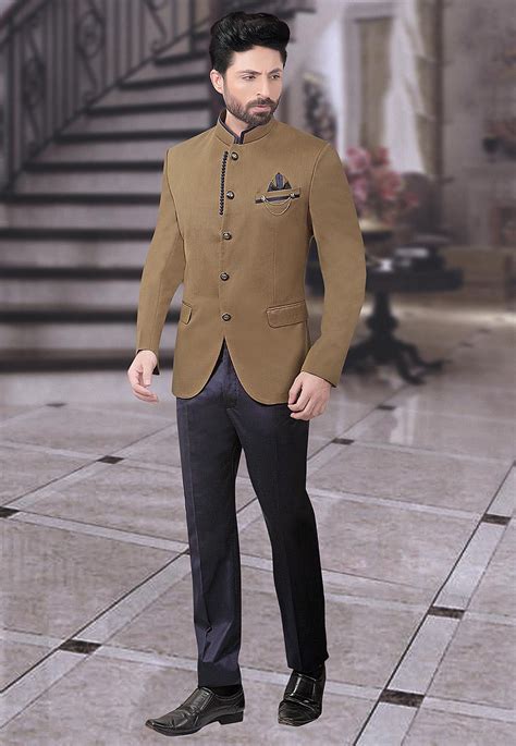 The top button is fastened and the lower button is always opened. Plain Terry Rayon Jodhpuri Suit in Beige : MHG764