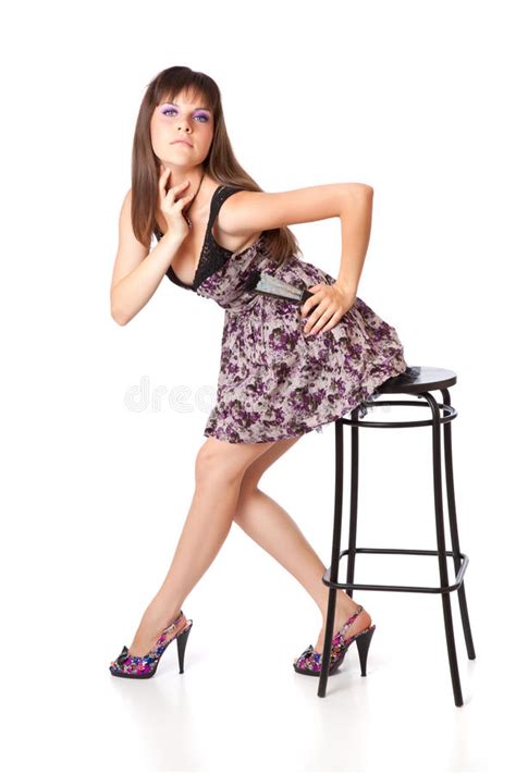 Beautiful Girl Is Sitting On A Stool Stock Image Image Of Cheerful