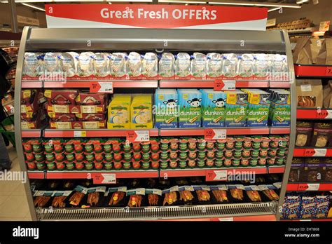 Supermarket Fridge Shelf With Offers In A Morrisons Local Supermarket