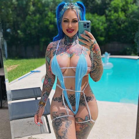 Tattoo Model Stops People From Scrolling As She Slips Into See