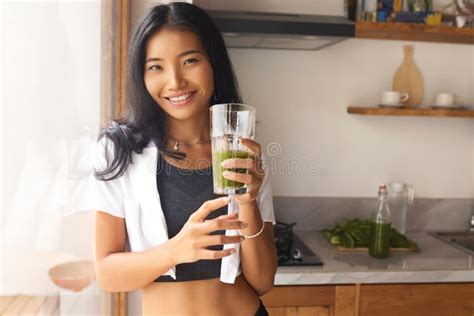 Healthy Meal Happy Asian Smiling Woman Drinking Green Detox Vegetable Smoothie Stock Image