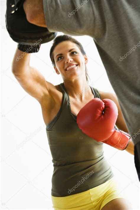 Woman Punching — Stock Photo © Iofoto 9309717