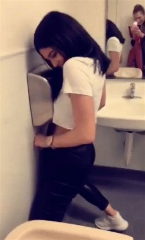 Kylie Jenner Caught Fanning Her Crotch Before Seductively Stroking Her Knee In Bizarre Snapchat