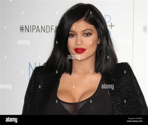 American Reality Television Star Kylie Jenner Poses For Photographers At The Launch Of Her New