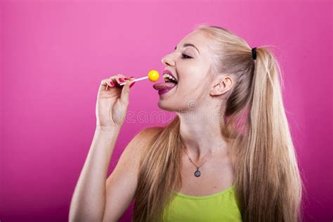Blonde Licks Sweet Citron Lollipop Stock Image Image Of Blonde Green