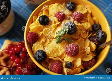 Healthy Breakfast Corn Flakes With Raspberries And Blueberries