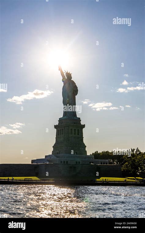 Statue Of Liberty With The Sun In Her Hand In New York City Stock Photo