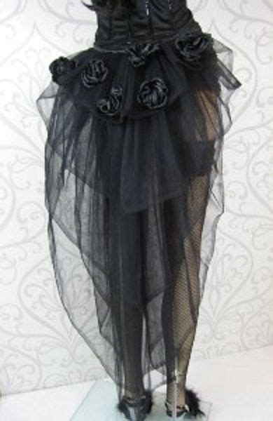 It has decorative buttons on the side front, and it has a black lace trim on the hem. Tulle Bustle - DIY one of these. | Steampunk skirt, Steampunk fashion, Burlesque outfit