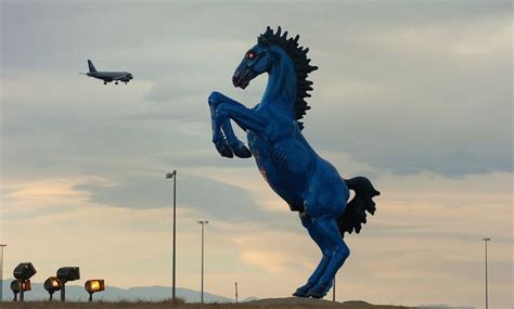What's the name of the blue mustang at denver airport? The big blue statue of a bucking mustang at Denver ...