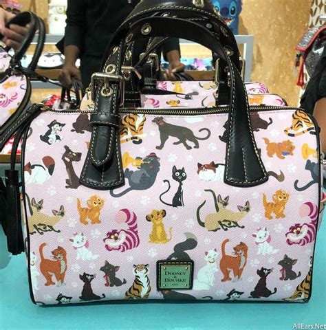 Maybe you would like to learn more about one of these? NEW Dooney and Bourke Cat Collection at Disney Springs ...