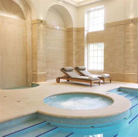 Private Yorkshire Swimming Pool With Traditional Arches Jacuzzi And Step Detail With Waterfall