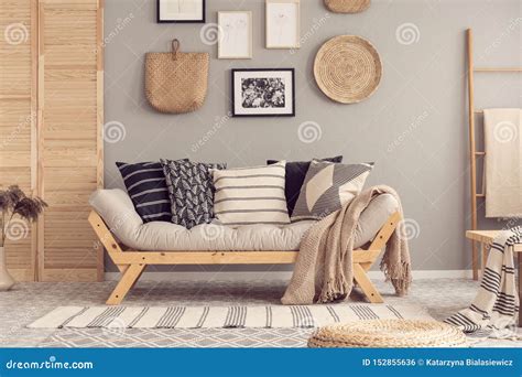 Scandinavian Living Room With Wooden And Natural Furniture Stock Photo
