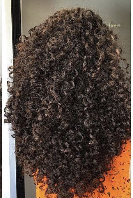 I finish off by diffusing with my dyson to dry my hair super fast! How To Get Great Volume In Your Curls - | CurlyHair.com