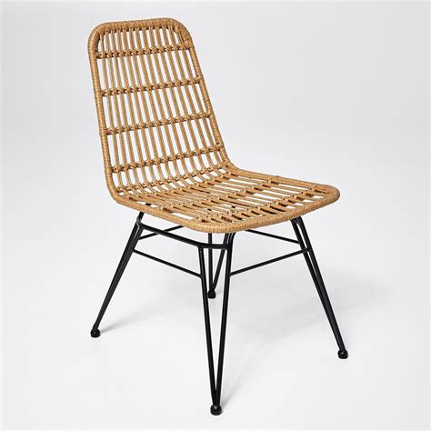 These casual chairs exude relaxed transitional flair and masterful craftsmanshipfinished in natural; Woven Dining Chair | Rattan dining chairs, Target dining ...