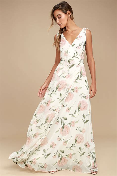 The beautiful white gown which has elegant rose floral prints around the waist with a bodice design. White Maxi Dress - Floral Maxi Dress - Plunging Maxi Dress ...