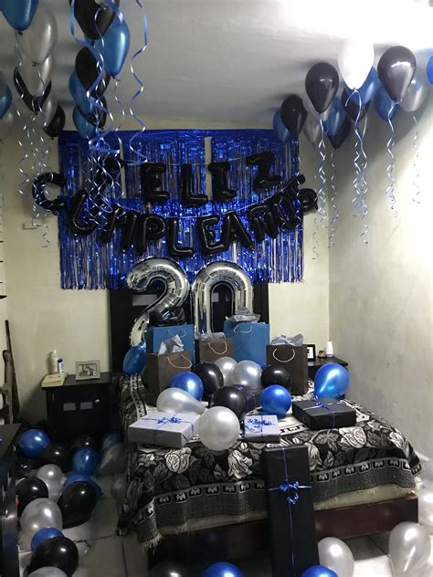 A Bedroom Decorated With Balloons And Streamers For A 21st Birthday