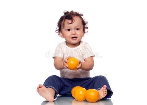 The Child With Oranges Stock Image Image Of Curly Freshness 3241447