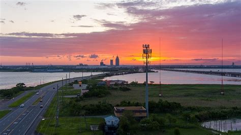 Mobile Bay Causeway At Sunset Stock Photo Download Image Now Aerial