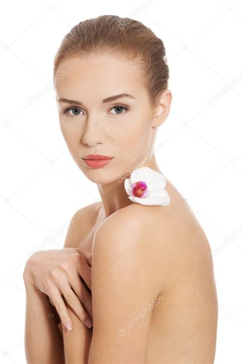 Nude Naked Woman Having White Flower On Shoulders Stock Photo By