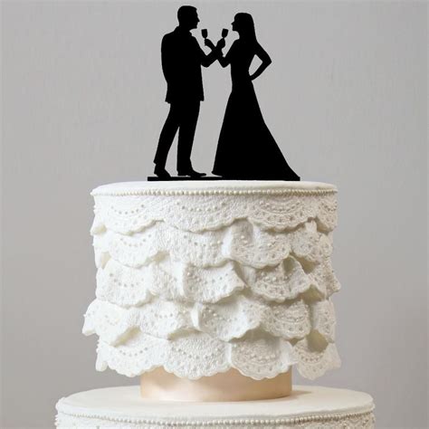 Beautiful Wedding Cake Toppers Drinking Toast And Celebrating Marriage