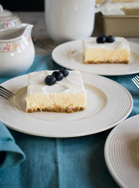 Press the crumbs into the bottom and up the sides of the pie pan, making a thicker layer on the bottom than on the sides. Mom's Cheesecake with Sour Cream Topping - Cooking with ...