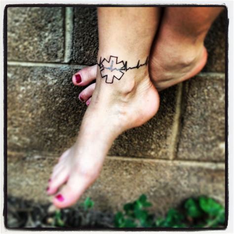 A tattoo, on the other hand, is always there, but it needs to be easily visible to paramedics to be effective. EKG EMT ankle tattoo | Ems tattoos, Paramedic tattoo, Ekg ...