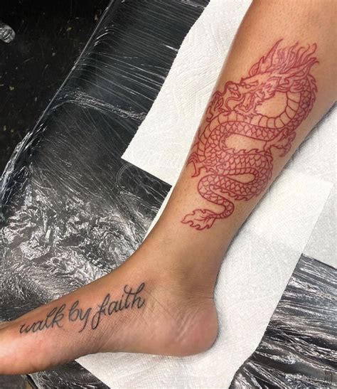 Women have worn ankle tattoos for centuries. Check out @simonelovee ️ | Red ink tattoos, Red tattoos, Dragon tattoo ankle