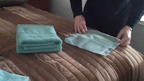How to fold baby clothes: Folding Bathroom Towels - YouTube