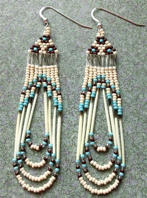 The Earrings Are Made From Beads And Wood