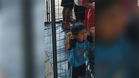 The Truth Behind This Photo Of An Immigrant Child Crying Inside A