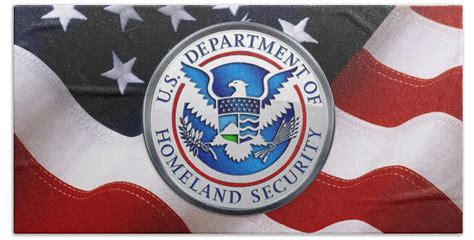 U S Department Of Homeland Security D H S Emblem Over American Flag
