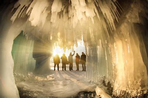 Surreal Landscape With People Exploring Mysterious Ice Grotto Cave