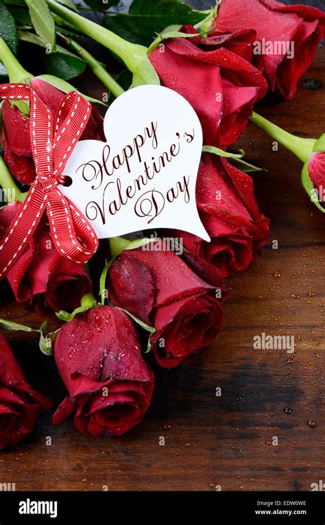 Happy Valentines Day Red Roses On Dark Recycled Wood Background With
