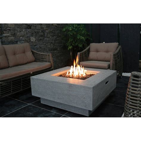A gas fire pit table, in the simplest terms, is a portable propane gas tank connected to a burner in a concave bowl or basket in the middle of a very stylish table meant to its natural magnesium oxide stone is durable and can withstand any weather making it a perfect addition to your outdoor furniture. Elementi Concrete Propane Fire Pit Table | Wayfair.co.uk ...
