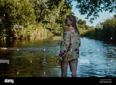 Beautiful Woman Skinny Dipping And Wild Swimming In River Stock Photo Alamy