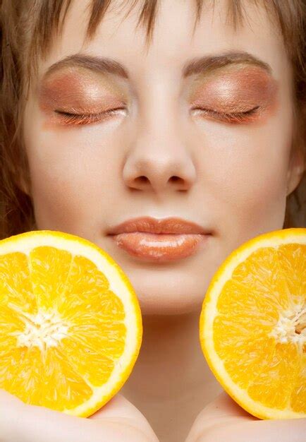 Premium Photo Beautiful Womans Face With Orange