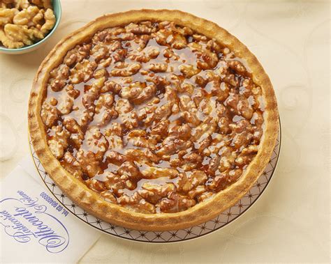 Ingredienti e preparazione di ogni ricetta di cucina con foto e possibilità di stampa. Crostata di Noci - Pasticceria Ottocento