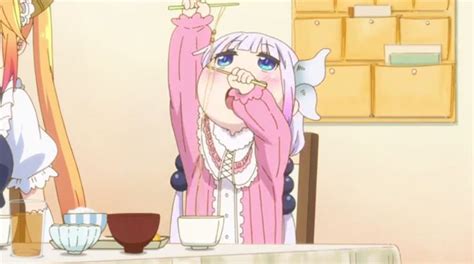 An Anime Character Sitting At A Table With Food In Front Of Her And Drinking From A Straw