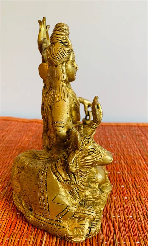 Golden Brass Yellow Metal Lord Shiva Idol Sitting W Nandi Cow 35922 Buy Shiva Statue Online