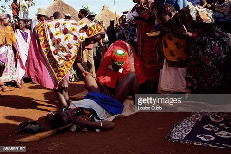 A Surgeon Performs A Circumcision On A Young Sabiny Woman During A