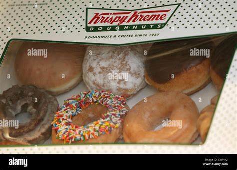 A Selection Of Krispy Kreme Doughnuts On Display Stock Photo Alamy
