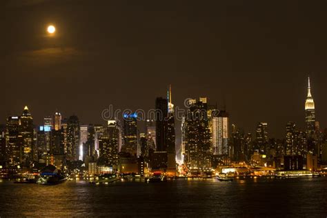 Warm City Lights On A Warm Night Under A Full Moon Stock Photo Image