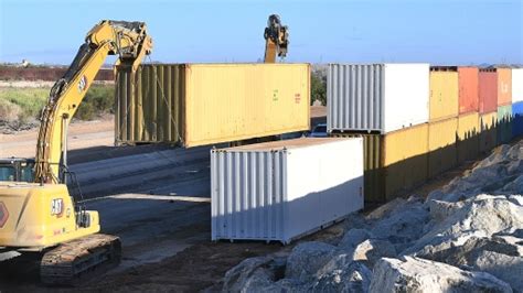 Arizonas Shipping Container Wall On Border Is Coming Down The Hill