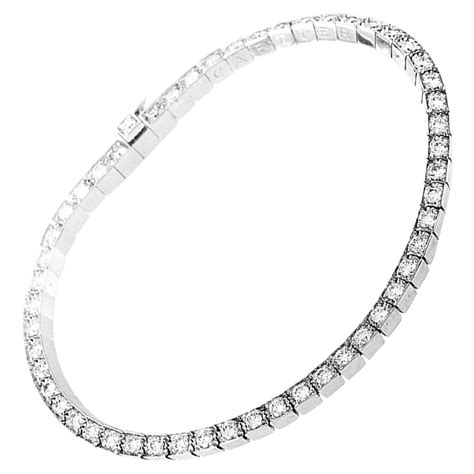 Diamond is a solid form of the element carbon with its atoms arranged in a crystal structure called diamond cubic. Cartier Laniere Diamond Gold Tennis Bracelet at 1stdibs