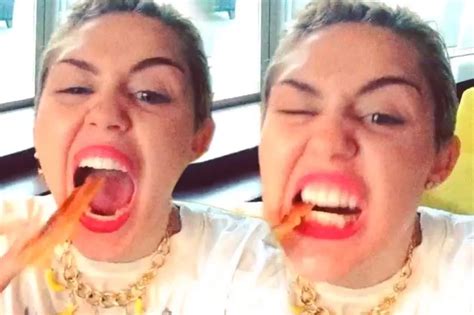 Miley Cyrus Sends Bizarre Video Of Her Eating Bacon To Pal Cara Delevingne Irish Mirror Online