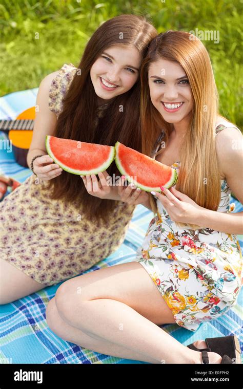 Two Beautiful Young Women On A Picnic Stock Photo Alamy