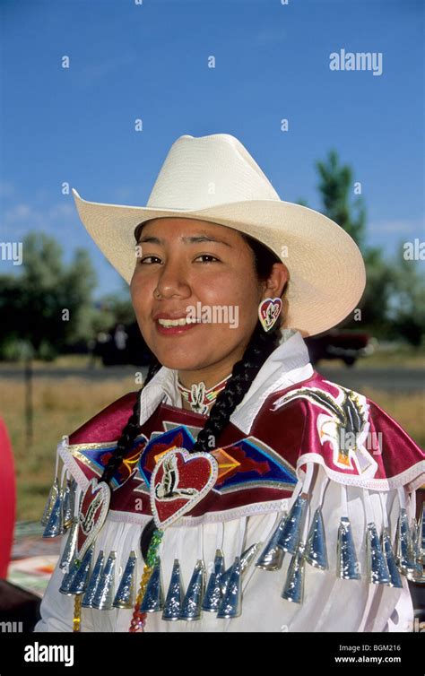 Native American Teenage Girl Wears A Cowboy Had And A