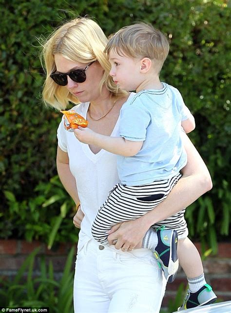 January Jones Carries Son Xander In All White Ensemble In Brentwood